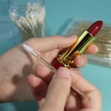 Barras de labios líquidas de tubo redondo con tapa rosa de 29 colores