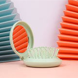 2-in-1 Folding Airbag Comb And Mirror