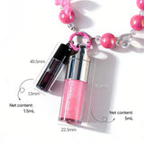 Two-piece Set Of Color-changing Lip Oils And A Bow-shaped Pearl Bracelet Charm.