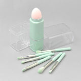 8 brochas de maquillaje en una caja transparente (incluye: brocha retráctil para polvos sueltos, esponja, huevo, ojos)