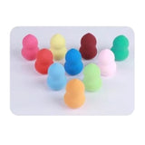Huevos de belleza en forma de calabaza de 7 colores (con caja redonda de plástico transparente)