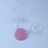 A Pair Of Round Eyelash Boxes